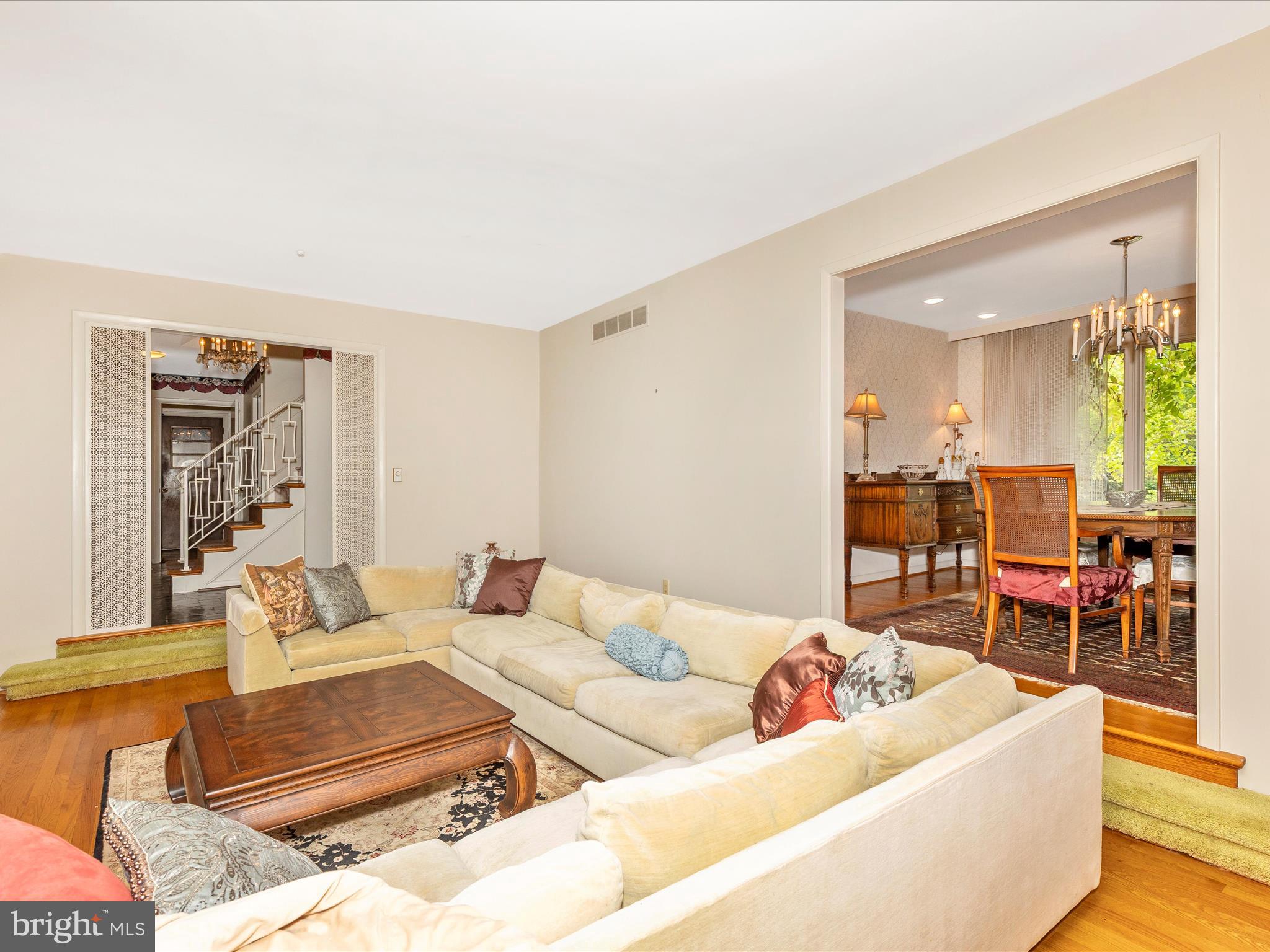 7903 Runnymeade Drive Frederick, MD 21702 - Photo 8 of 51 a living room with furniture and a table