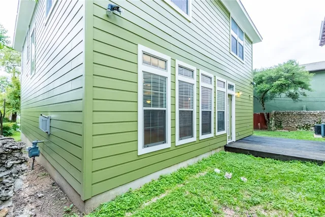 a view of a back yard of the house