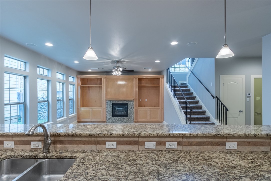 306 East 34th Street, Unit A Austin, TX 78705 - Photo 28 of 28 a room with lots of windows and a rug