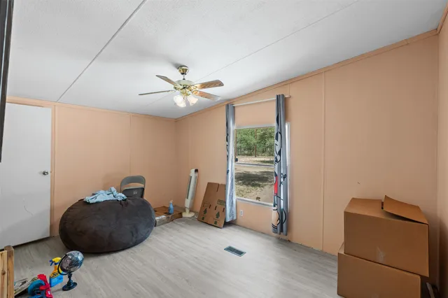 a room with furniture and a chandelier