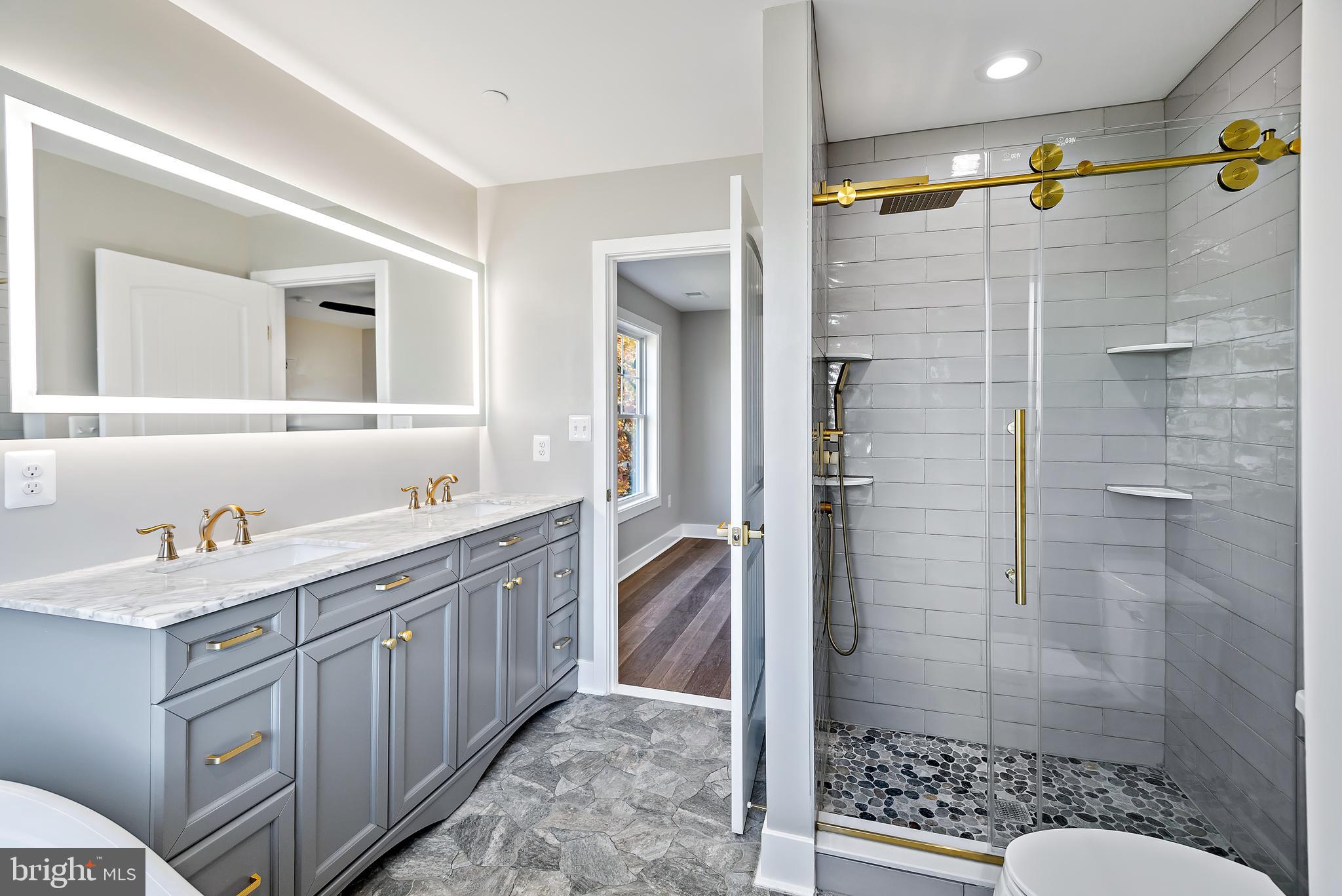 1220 Daves Road Edgewater, MD 21037 - Photo 45 of 79 Owner bath with custom mirror/light with antifog