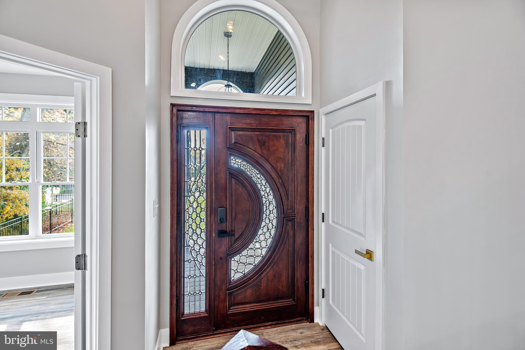 1220 Daves Road Edgewater, MD 21037 - Photo 6 of 79 Custom solid mahogany door w/side light that opens