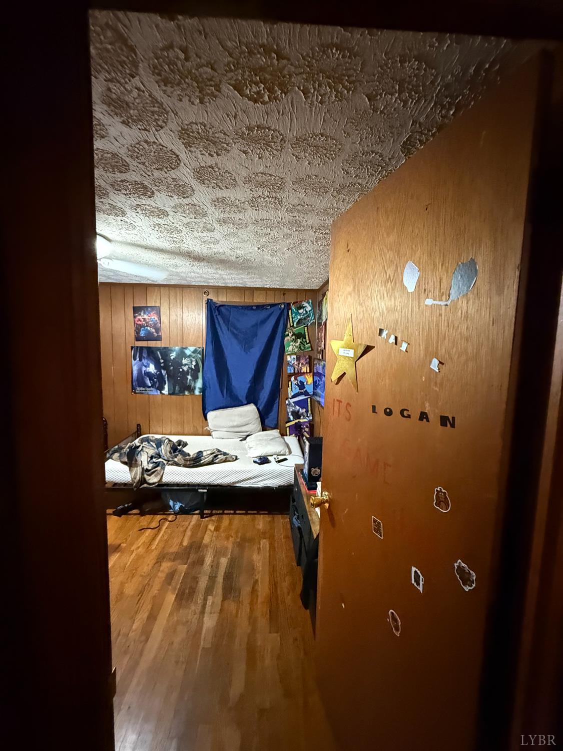 6218 Old Evergreen Road Appomattox, VA 24522 - Photo 11 of 17 a view of water heater room with wooden floor