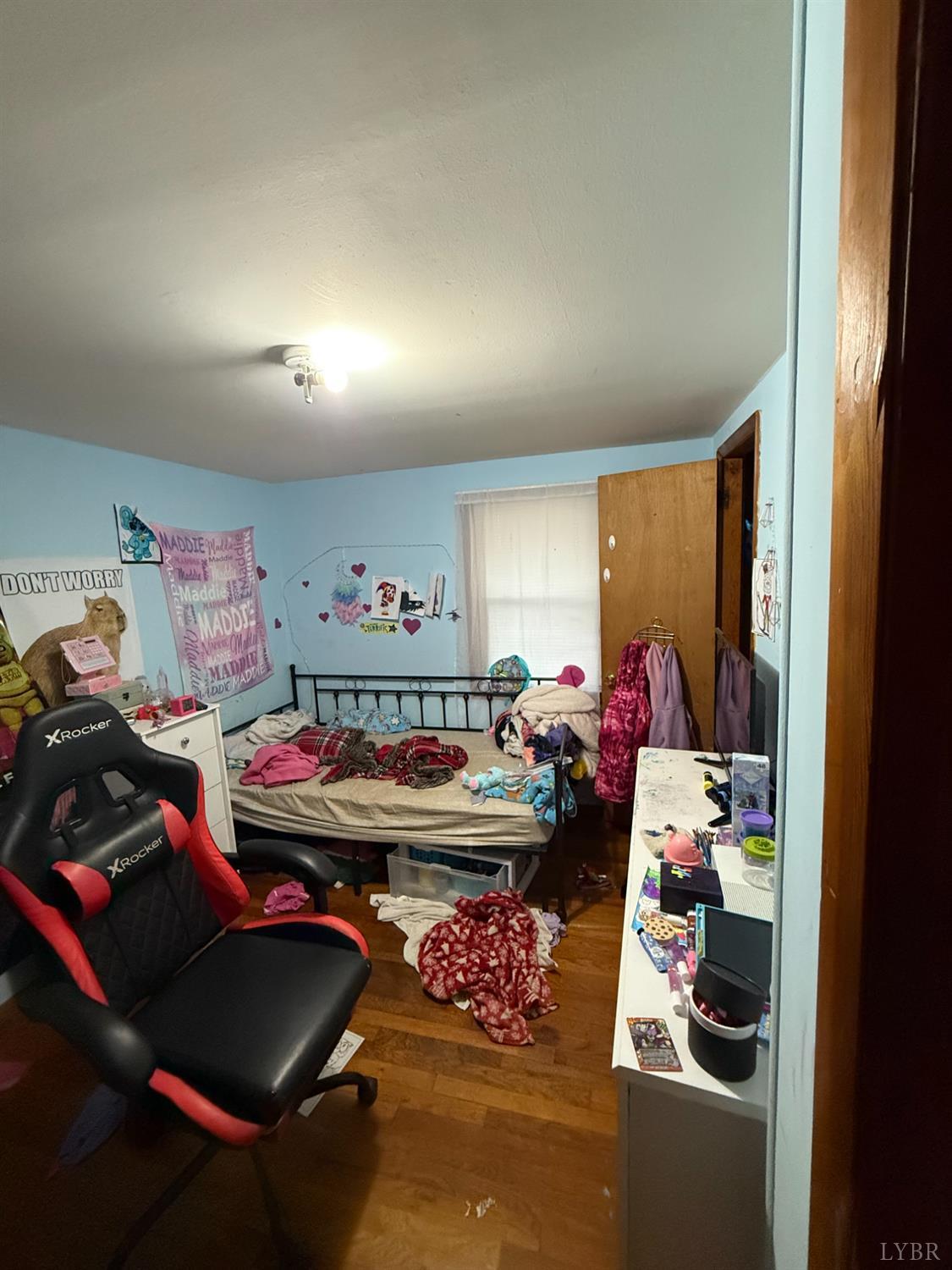 6218 Old Evergreen Road Appomattox, VA 24522 - Photo 14 of 17 a room with furniture and a wooden floor