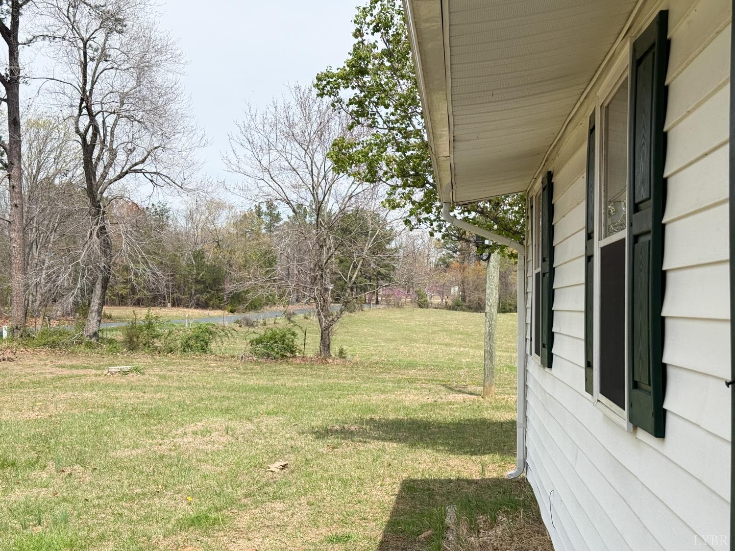 6218 Old Evergreen Road Appomattox, VA 24522 - Photo 2 of 11 a view of a yard with an outdoor space