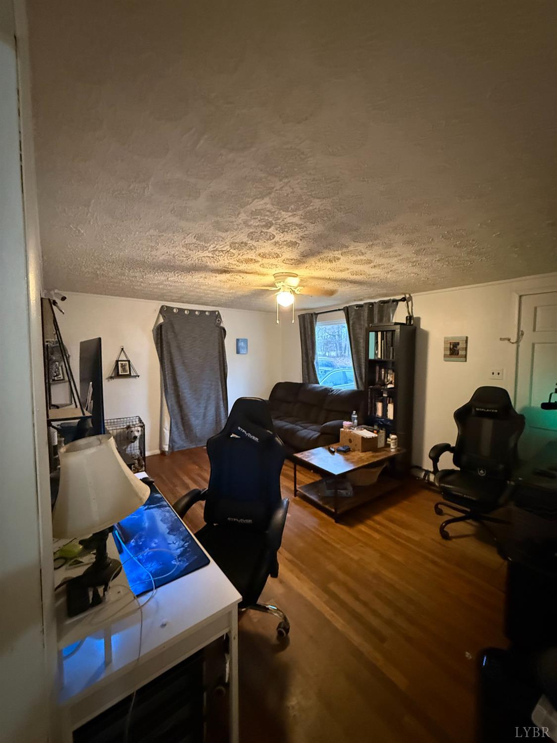 6218 Old Evergreen Road Appomattox, VA 24522 - Photo 7 of 17 a living room with furniture and a window