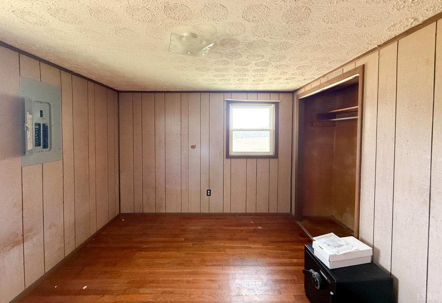 6218 Old Evergreen Road Appomattox, VA 24522 - Photo 8 of 11 a view of a livingroom with furniture and wooden floor