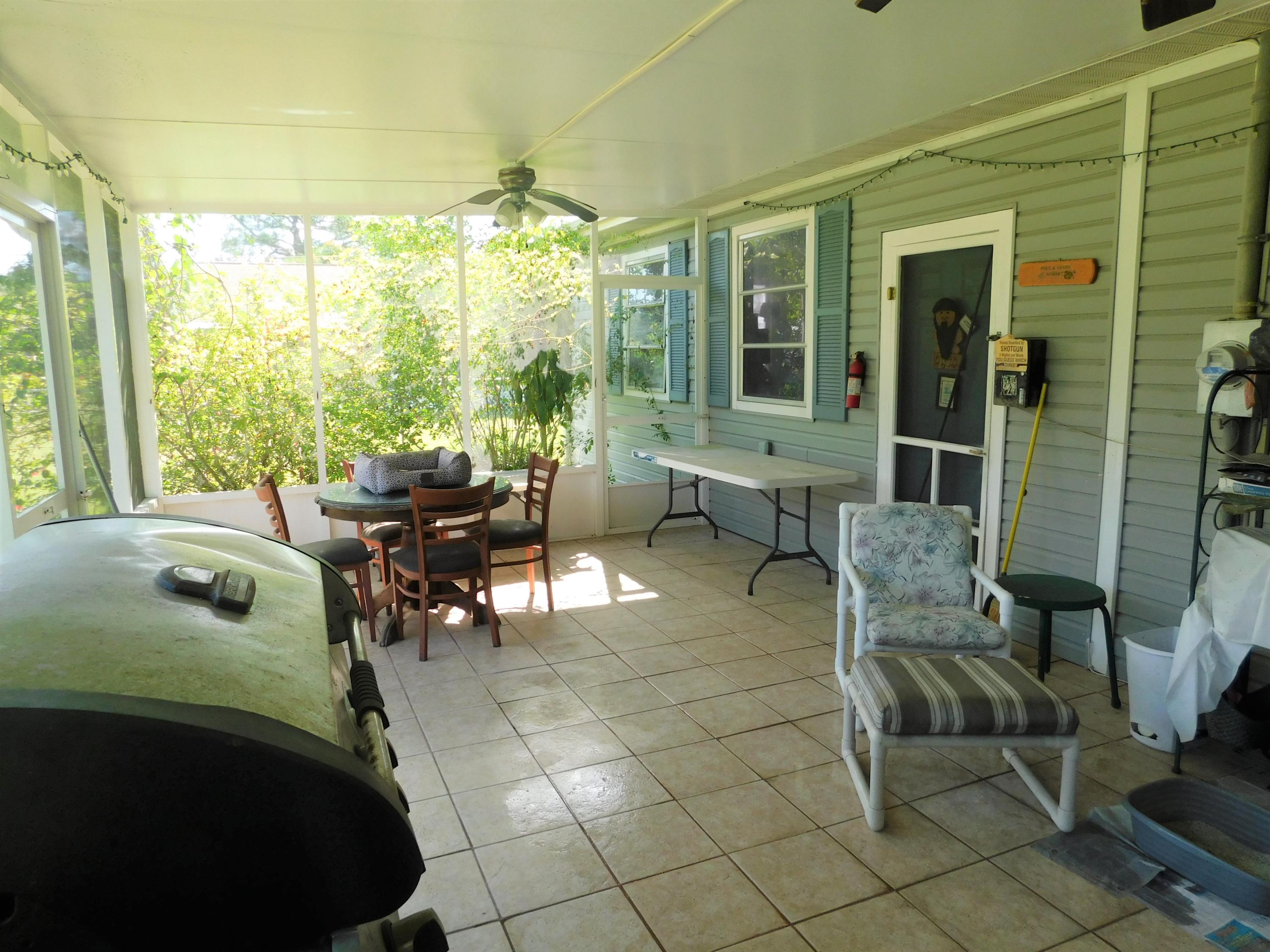 6352 Indrio Road Fort Pierce, FL 34951 - Photo 25 of 33 Screened Porch