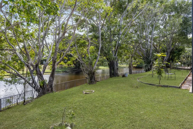 a very nice looking living room with a large window