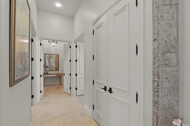 a view of a house with swimming pool and sitting area