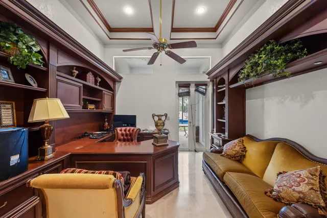 a view of swimming pool with a table and chairs