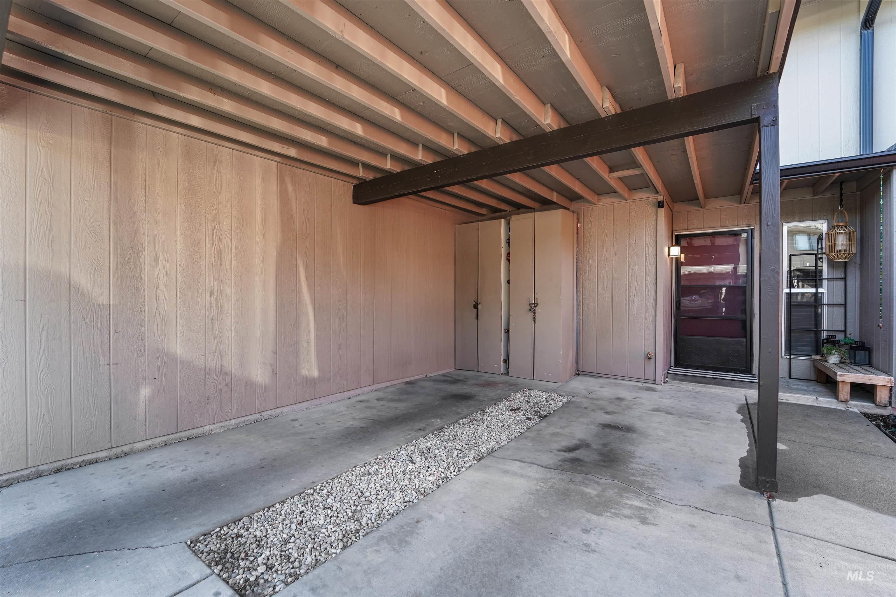 348 North Eagle Road Eagle, ID 83616 - Photo 21 of 31 Garage featuring wooden walls