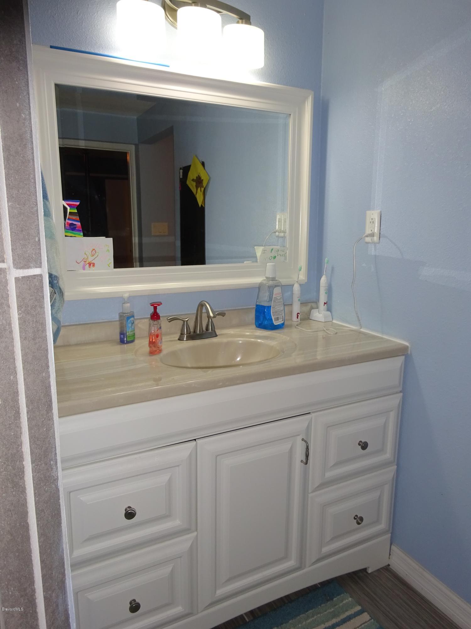 48 Valencia Road Rockledge, FL 32955 - Photo 13 of 21 master vanity