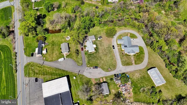 a view of a front of house with a yard