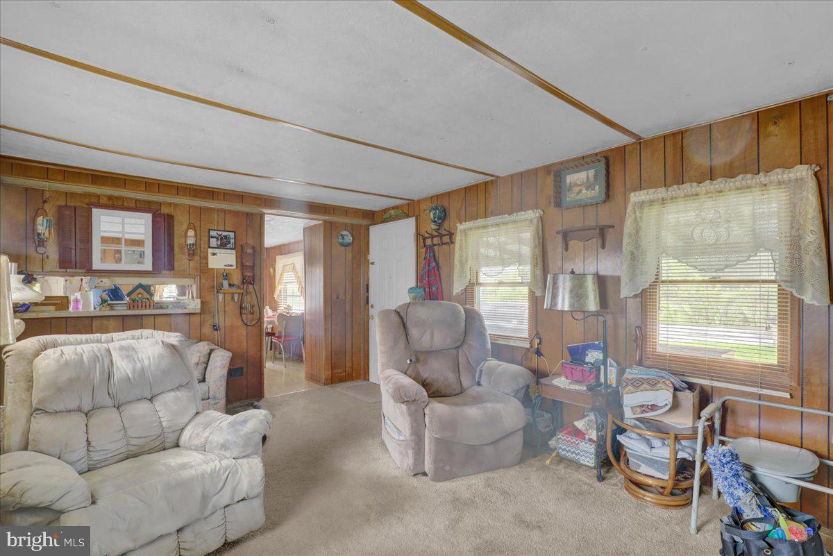 154 West Maple Grove Road Denver, PA 17517 - Photo 32 of 59 a living room with furniture and a large window