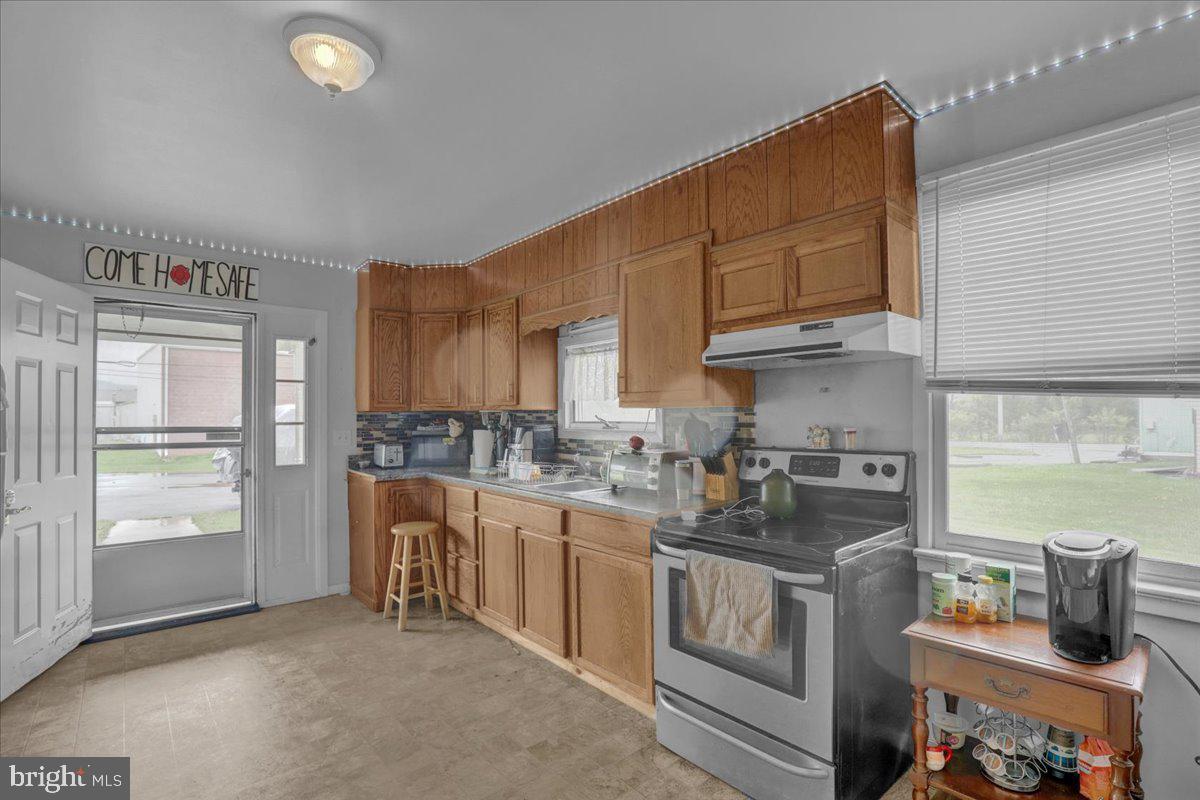 154 West Maple Grove Road Denver, PA 17517 - Photo 41 of 59 a kitchen with a sink cabinets and appliances