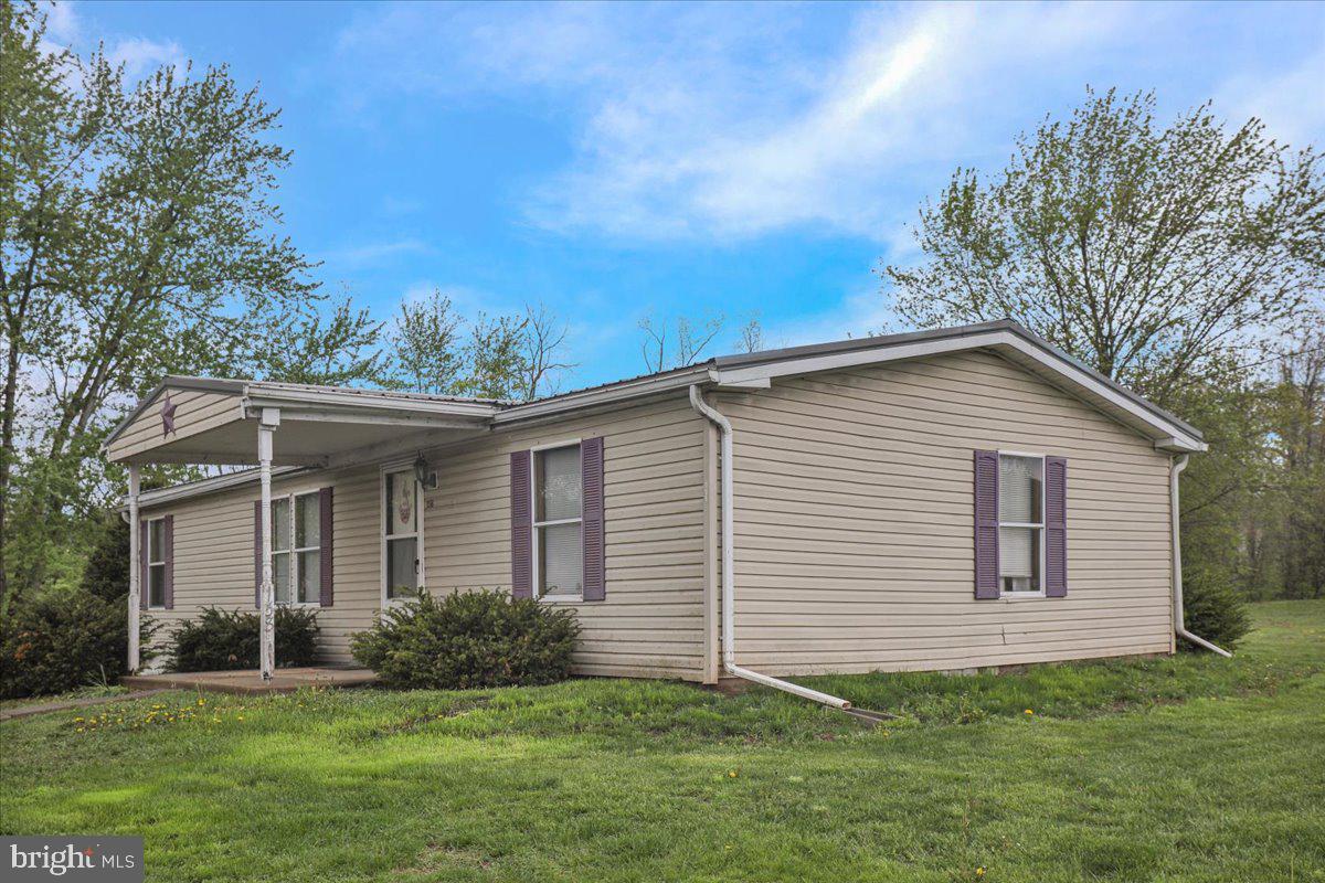154 West Maple Grove Road Denver, PA 17517 - Photo 54 of 59 a view of a house with a yard
