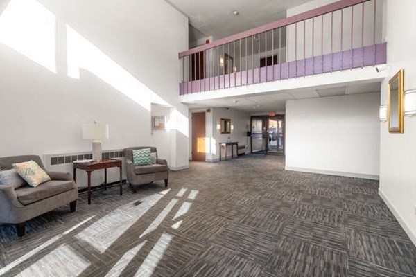 64 Main Street, Unit 53B Stoneham, MA 02180 - Photo 11 of 36 a living room with furniture