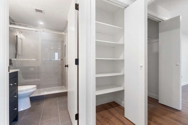 64 Main Street, Unit 53B Stoneham, MA 02180 - Photo 32 of 36 a bathroom with a shower a toilet and a sink