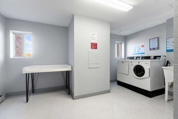 64 Main Street, Unit 53B Stoneham, MA 02180 - Photo 35 of 36 a utility room with dryer and washer
