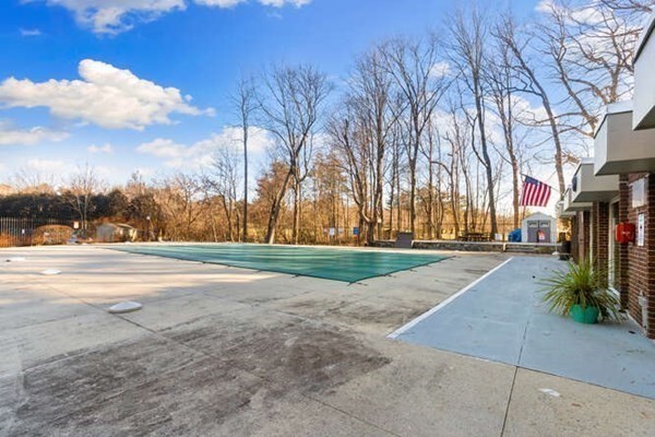 64 Main Street, Unit 53B Stoneham, MA 02180 - Photo 6 of 36 a view of road with trees