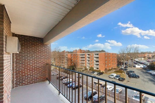 64 Main Street, Unit 53B Stoneham, MA 02180 - Photo 9 of 36 a view of city from a balcony