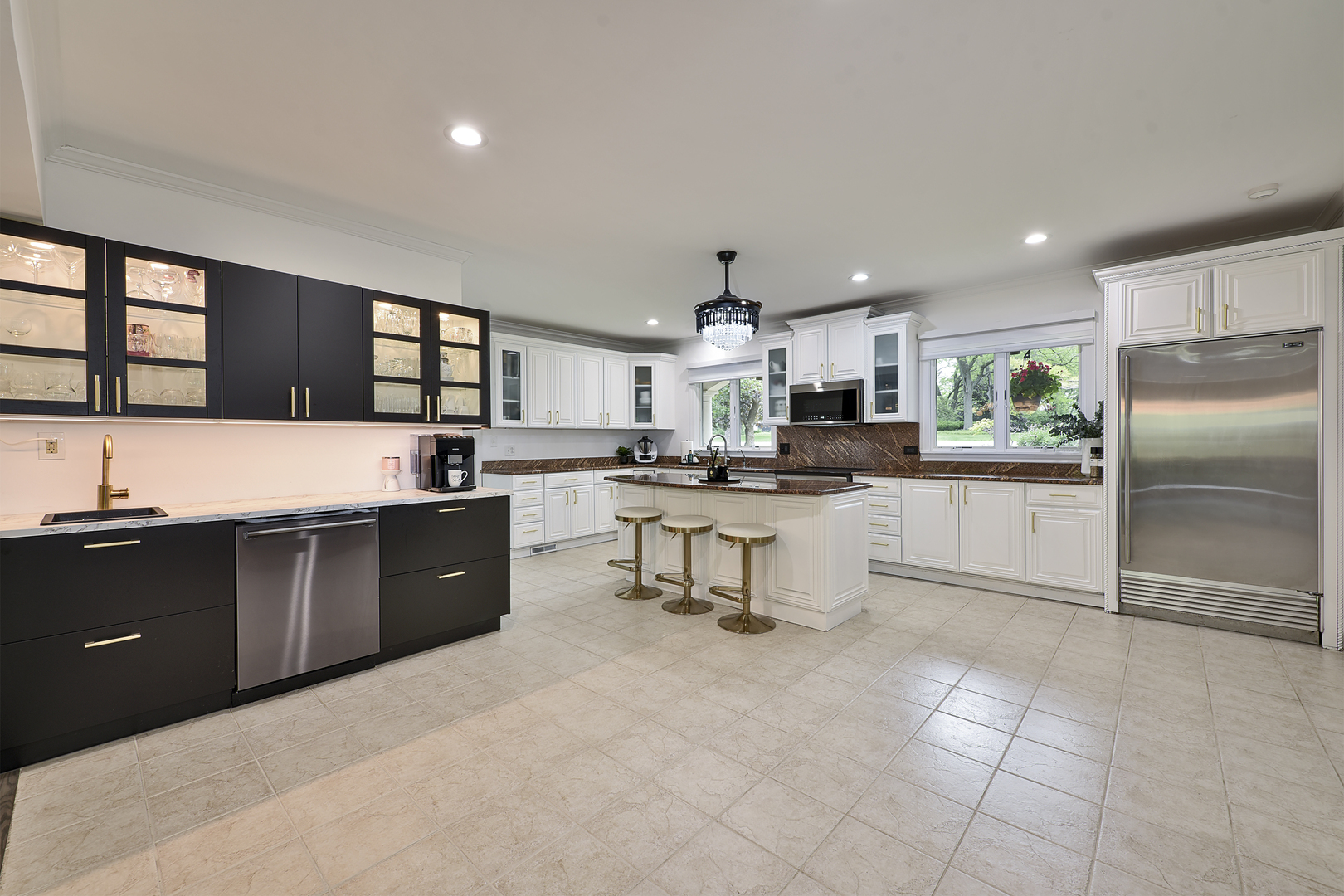 144 North Highland Road Inverness, IL 60067 - Photo 7 of 49 a kitchen with a refrigerator and a sink