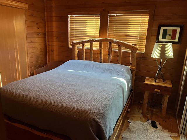 534 Scott's School Road Flatonia, TX 78941 - Photo 16 of 27 a bedroom with a bed and a window