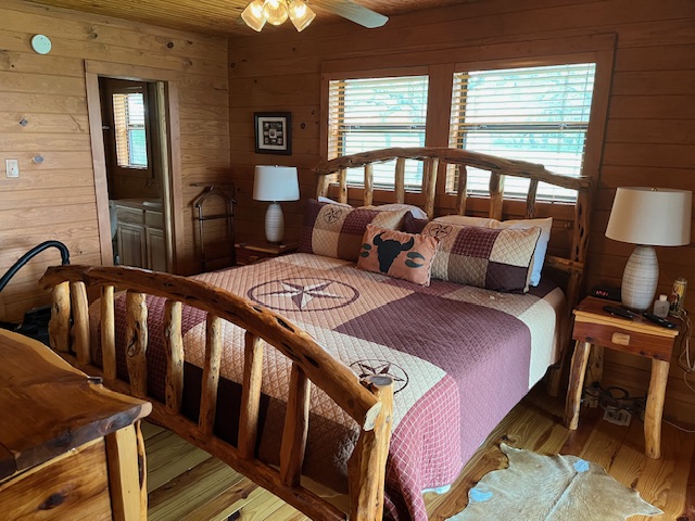 534 Scott's School Road Flatonia, TX 78941 - Photo 19 of 27 a bedroom with bed and wooden floor
