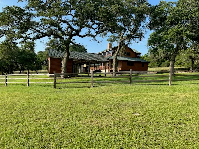a view of a yard with a trees