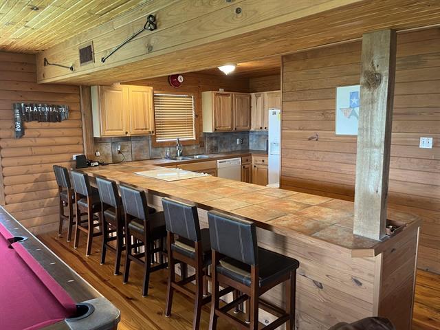 534 Scott's School Road Flatonia, TX 78941 - Photo 3 of 27 a dining table with chairs and window