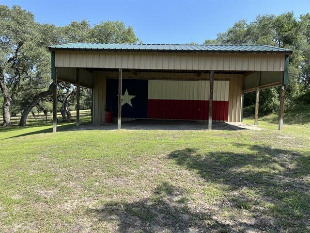 534 Scott's School Road Flatonia, TX 78941 - Photo 5 of 27 a view of a house with a yard and garage