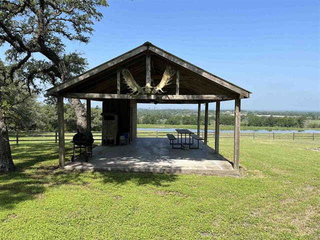 534 Scott's School Road Flatonia, TX 78941 - Photo 8 of 27 a view of a house with backyard and porch