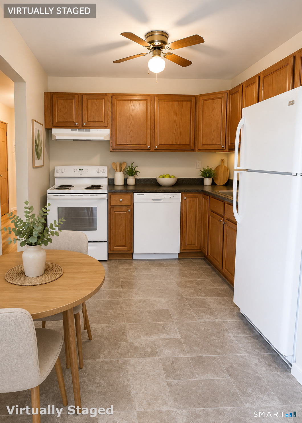 308 Meadowside Road, Unit 212 Milford, CT 06460 - Photo 2 of 8 a kitchen with stainless steel appliances granite countertop a stove a sink and a refrigerator