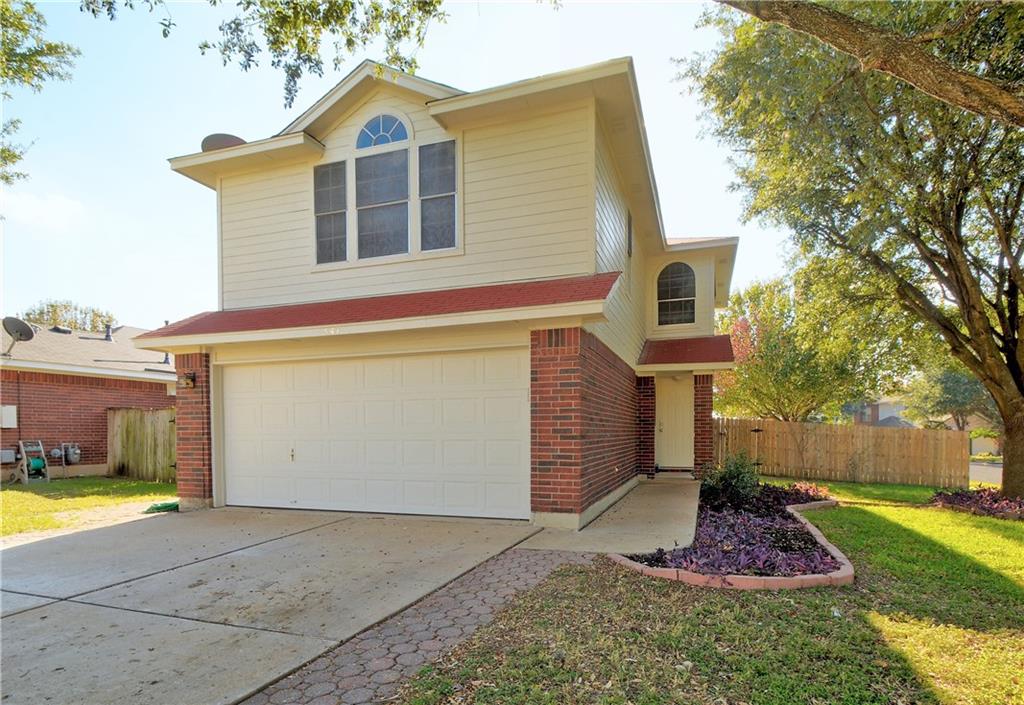 541 Shant Street Austin, TX 78748 - Photo 1 of 1 Traditional home with a garage, brick siding, and concrete driveway