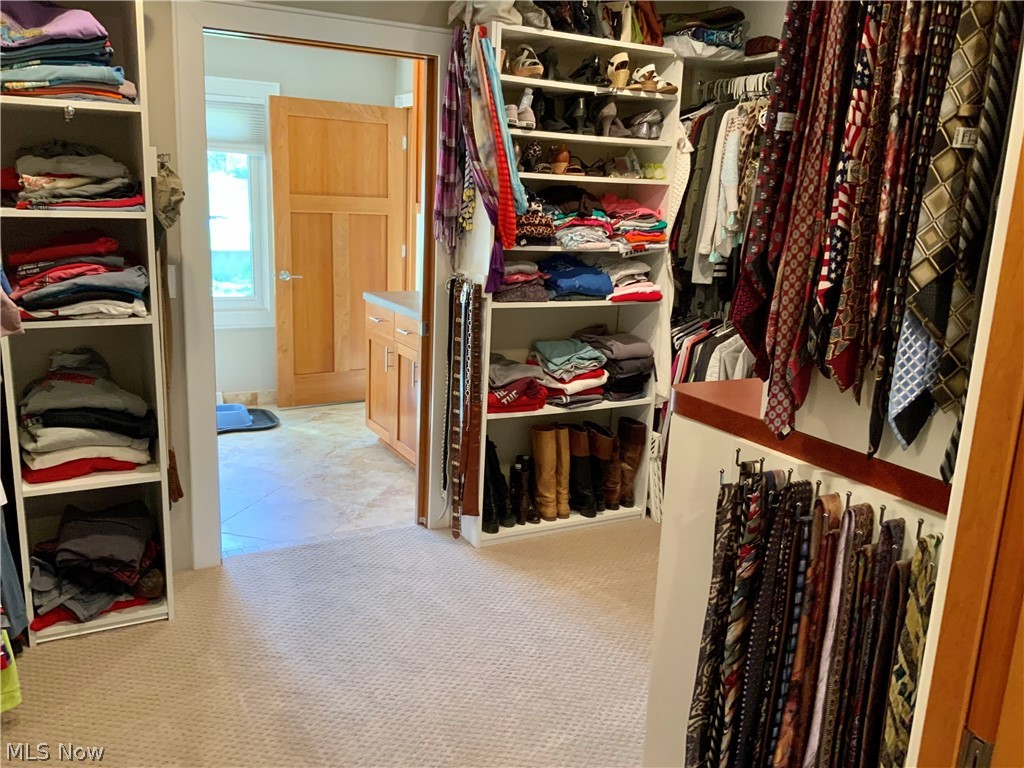 309 Riverside Drive Huron, OH 44839 - Photo 22 of 35 Large Master Walk-In Closet Leading to Laundry Room. All on Main Floor