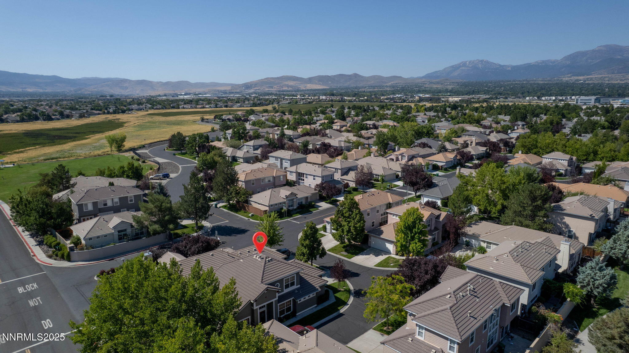 1295 Tule Drive Reno, NV 89521 - Photo 28 of 45 an aerial view of a city with lots of residential buildings