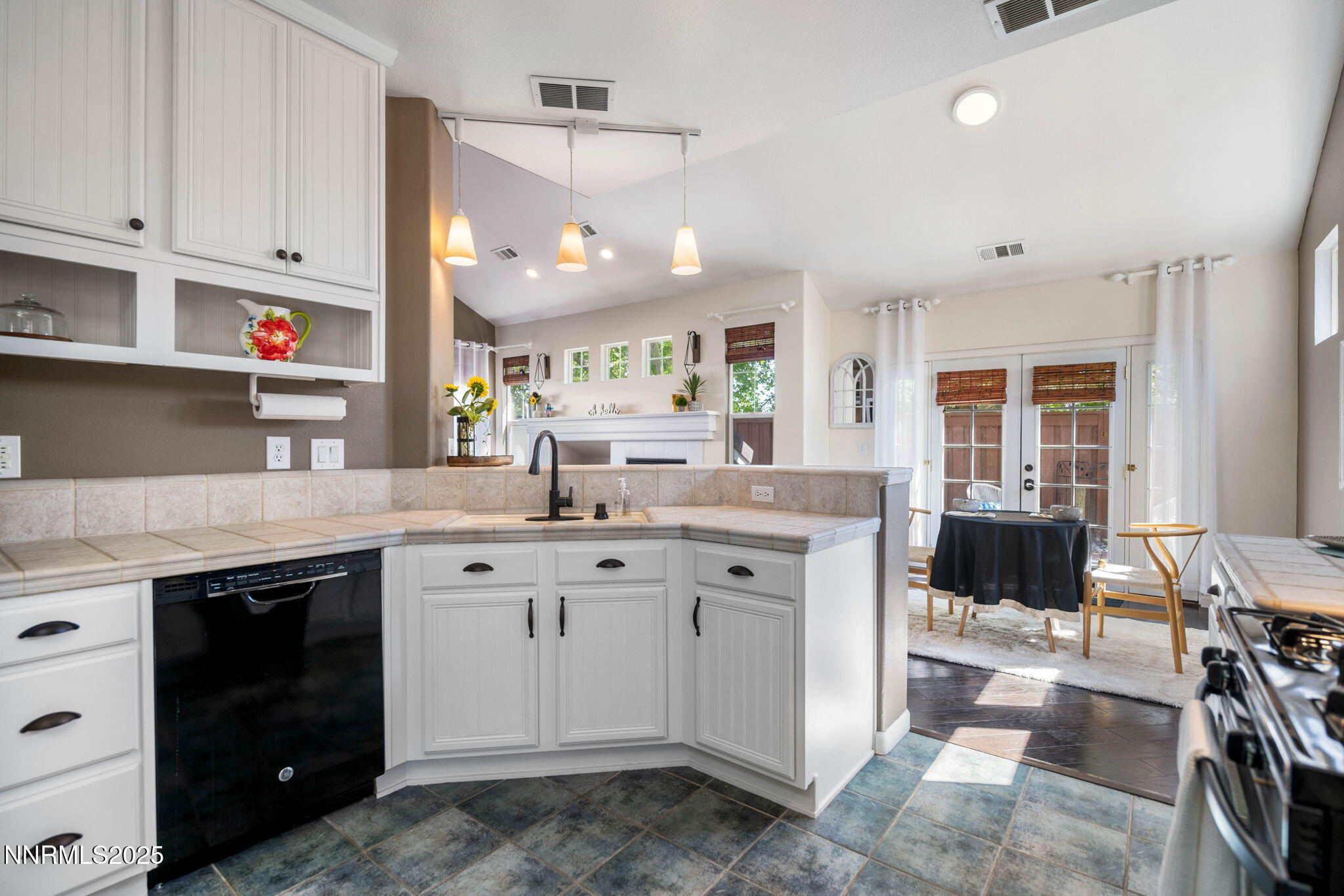 1295 Tule Drive Reno, NV 89521 - Photo 33 of 45 a kitchen with a sink and cabinets