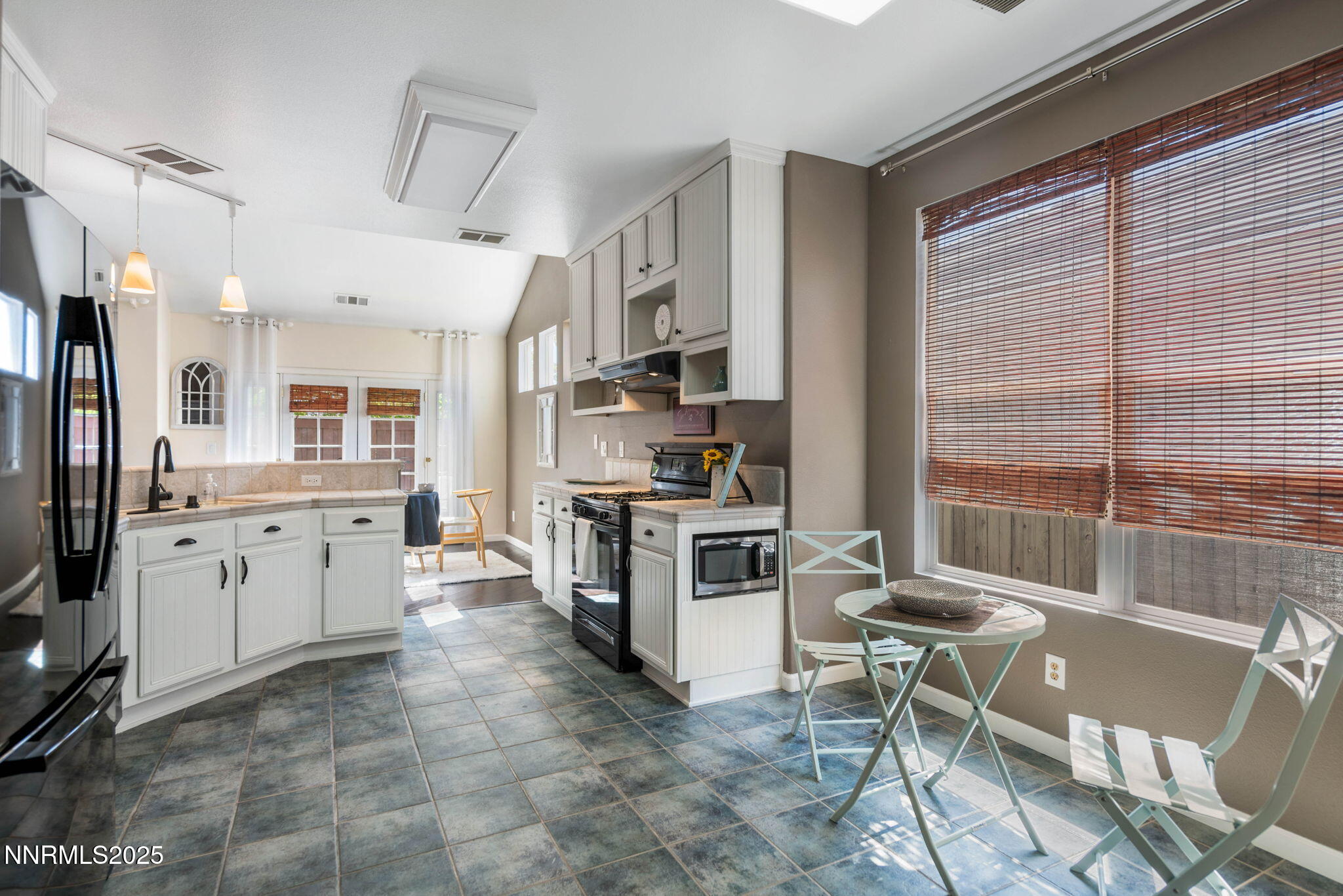 1295 Tule Drive Reno, NV 89521 - Photo 7 of 45 Spacious and well lit kitchen