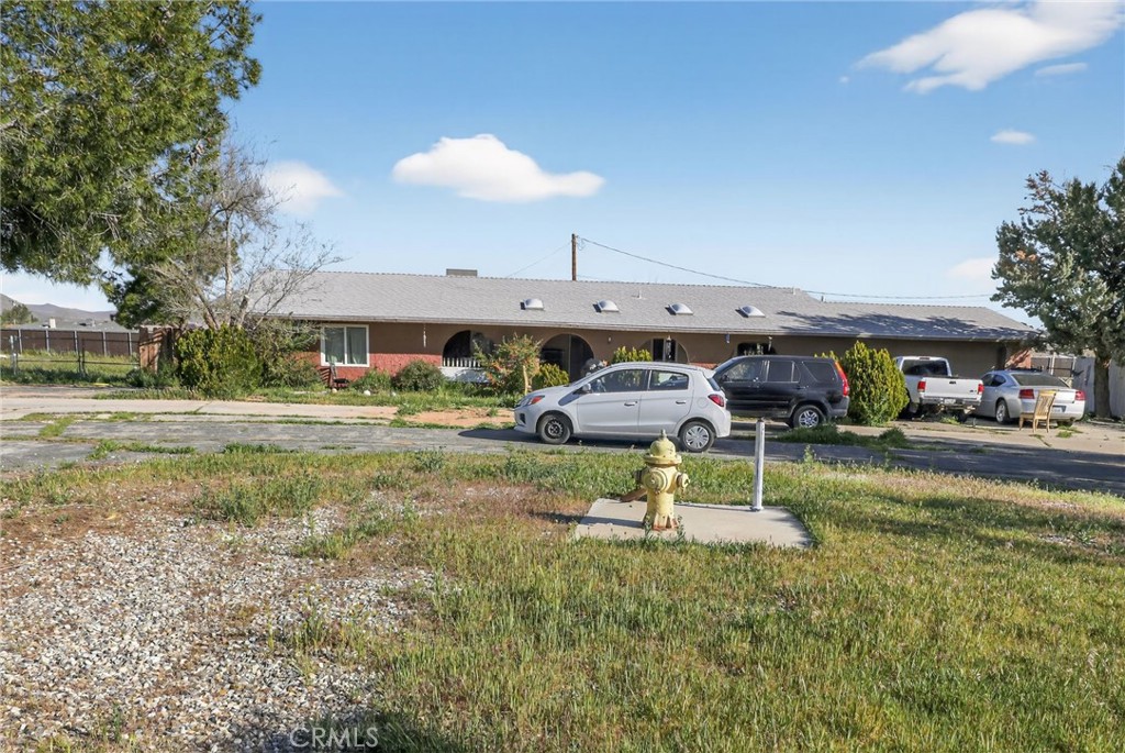15190 Cheyenne Road Apple Valley, CA 92307 - Photo 6 of 9 a view of a swimming pool with a patio
