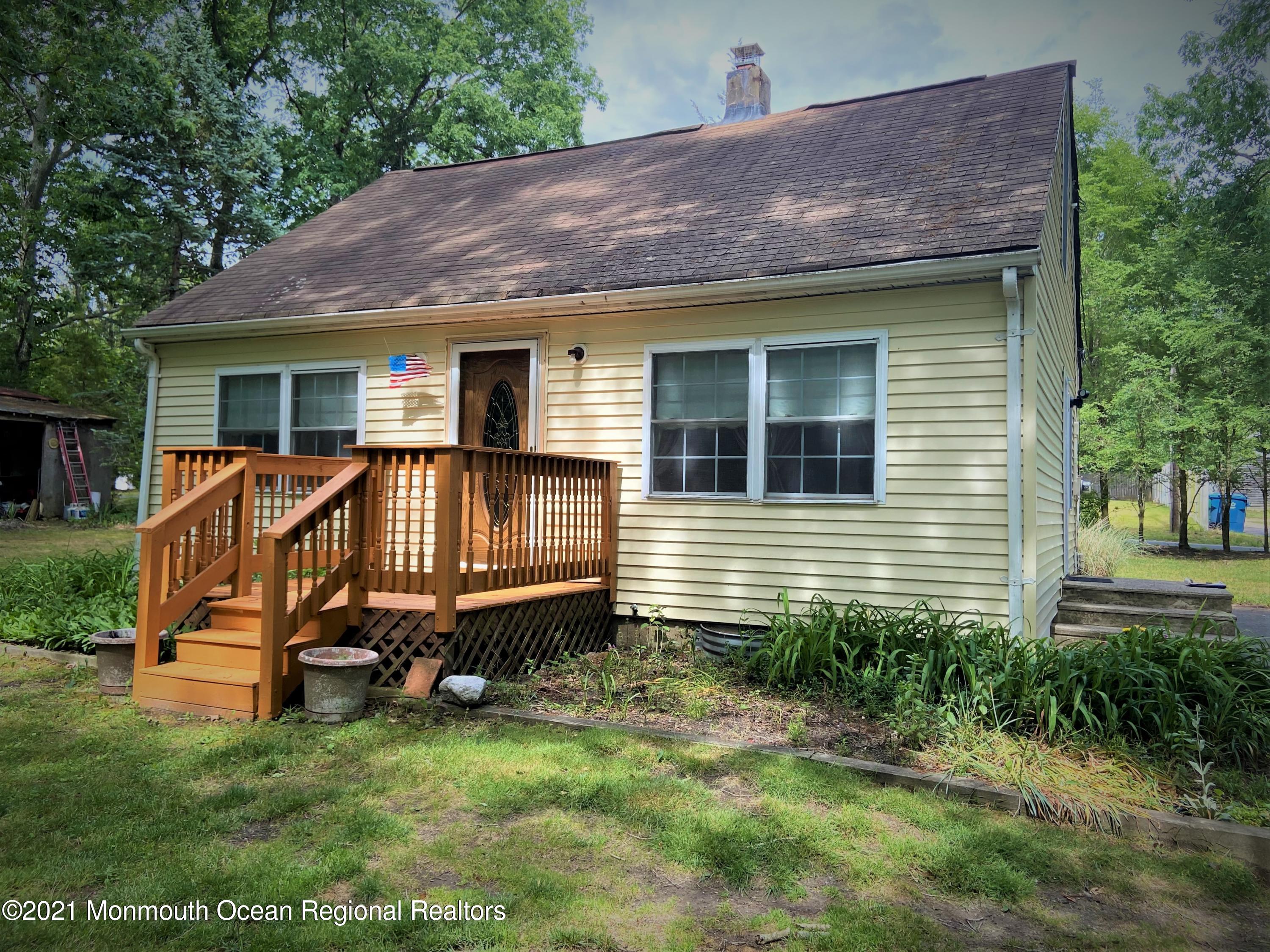 361 Black Oak Road Jackson, NJ 08527 - Photo 1 of 57 a house view with a backyard space