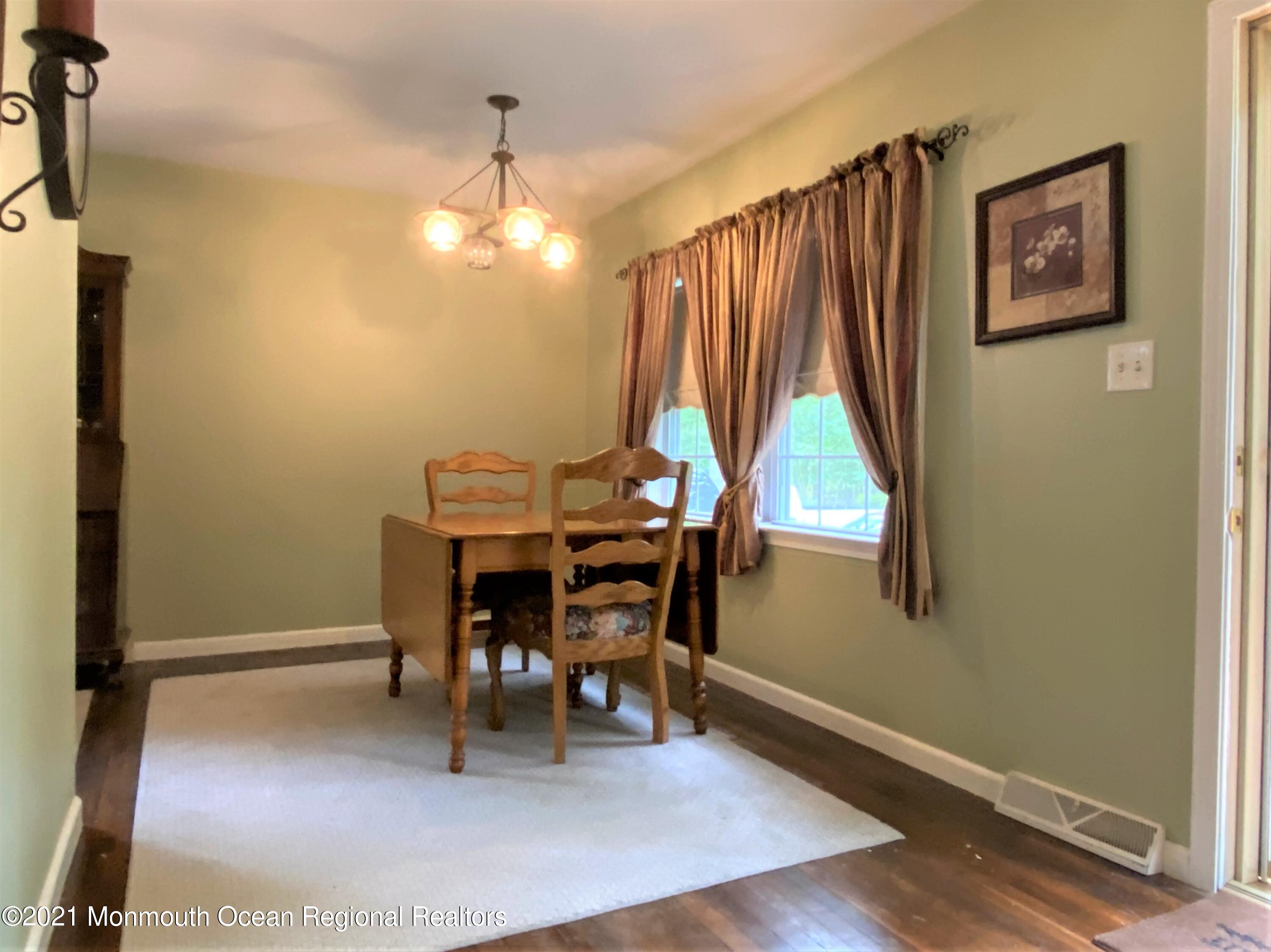361 Black Oak Road Jackson, NJ 08527 - Photo 13 of 57 a dining room with furniture and window