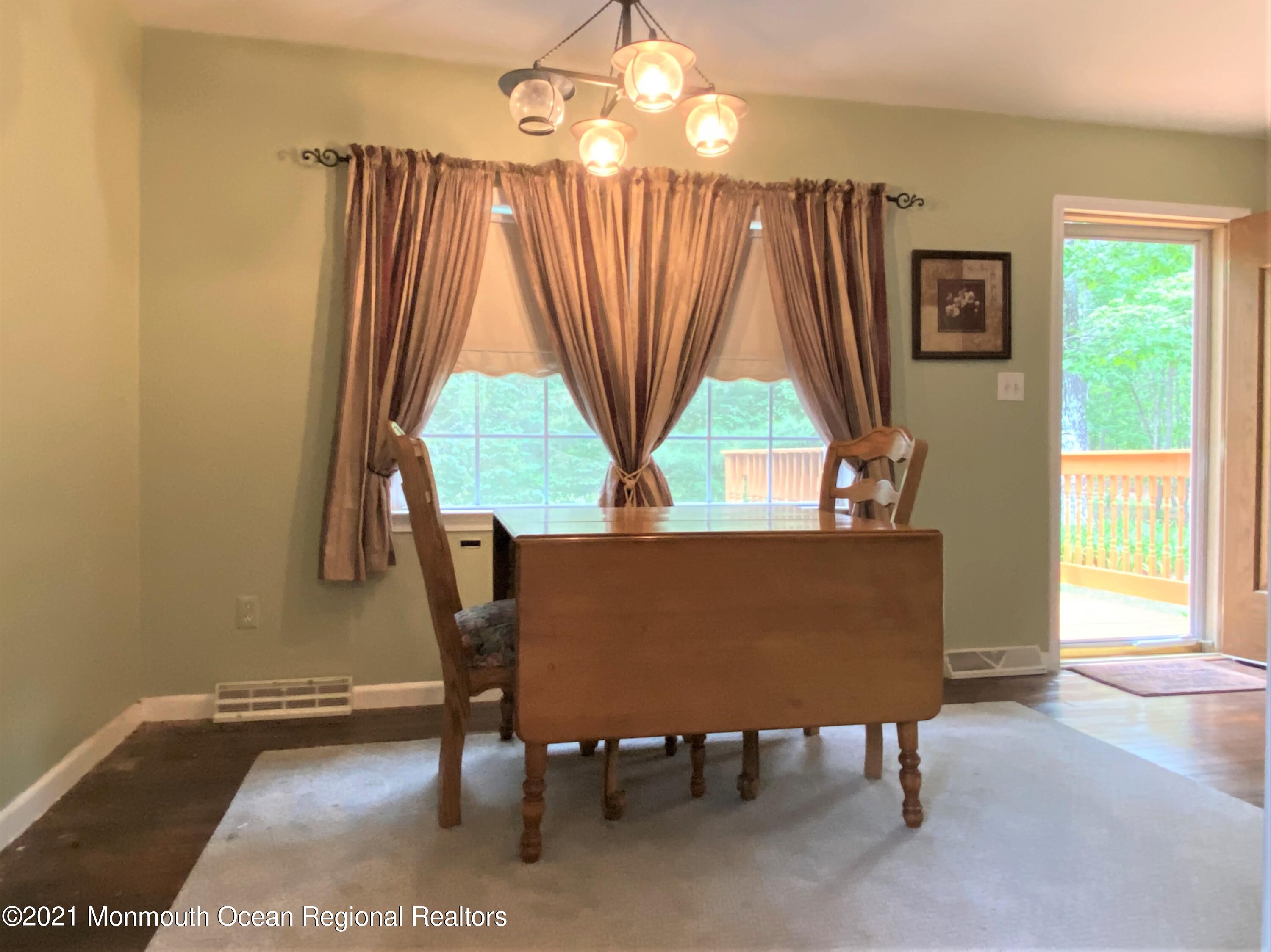 361 Black Oak Road Jackson, NJ 08527 - Photo 15 of 57 a view of a dining room with furniture and window