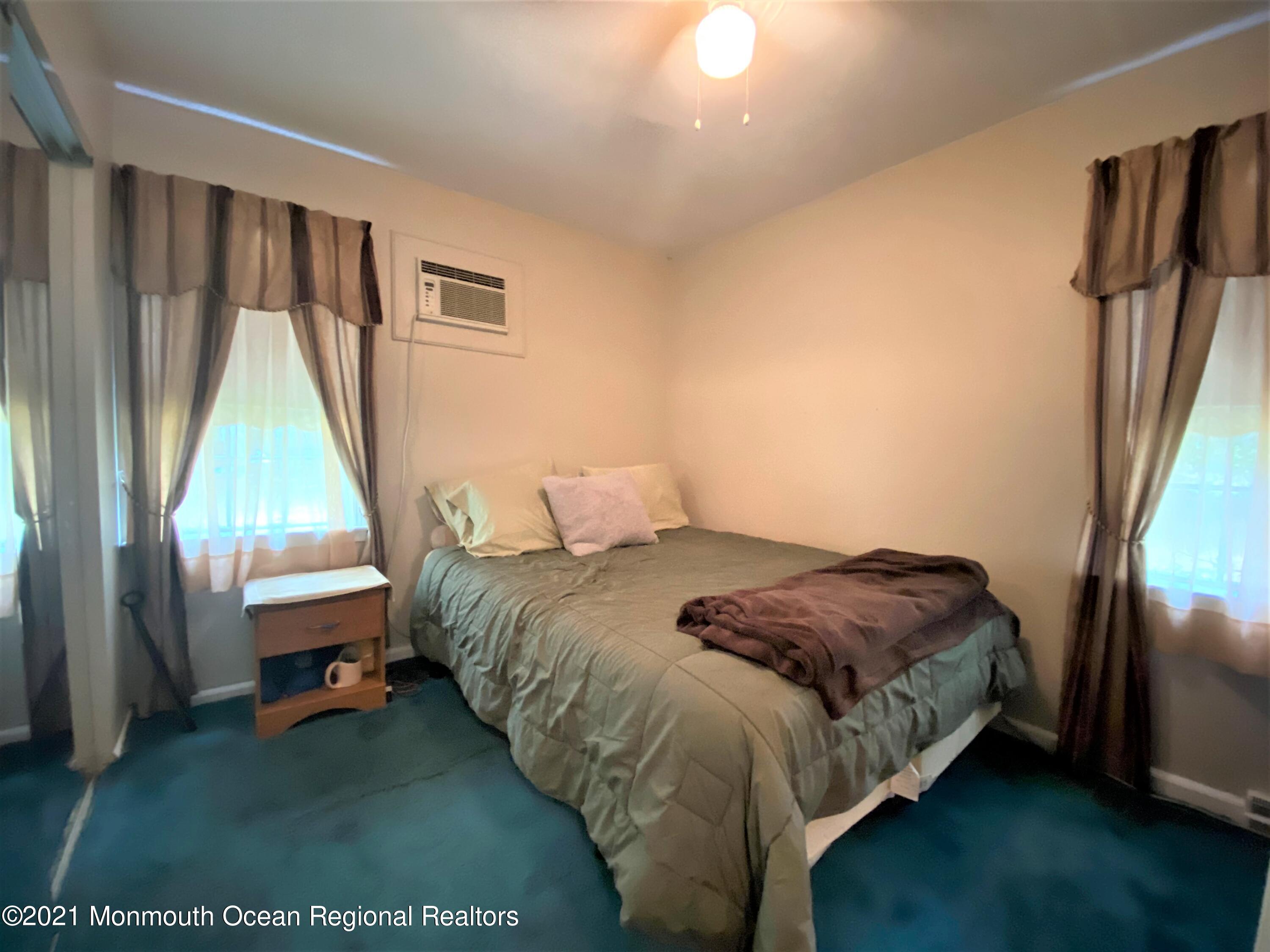 361 Black Oak Road Jackson, NJ 08527 - Photo 18 of 57 a bedroom with a bed and a window