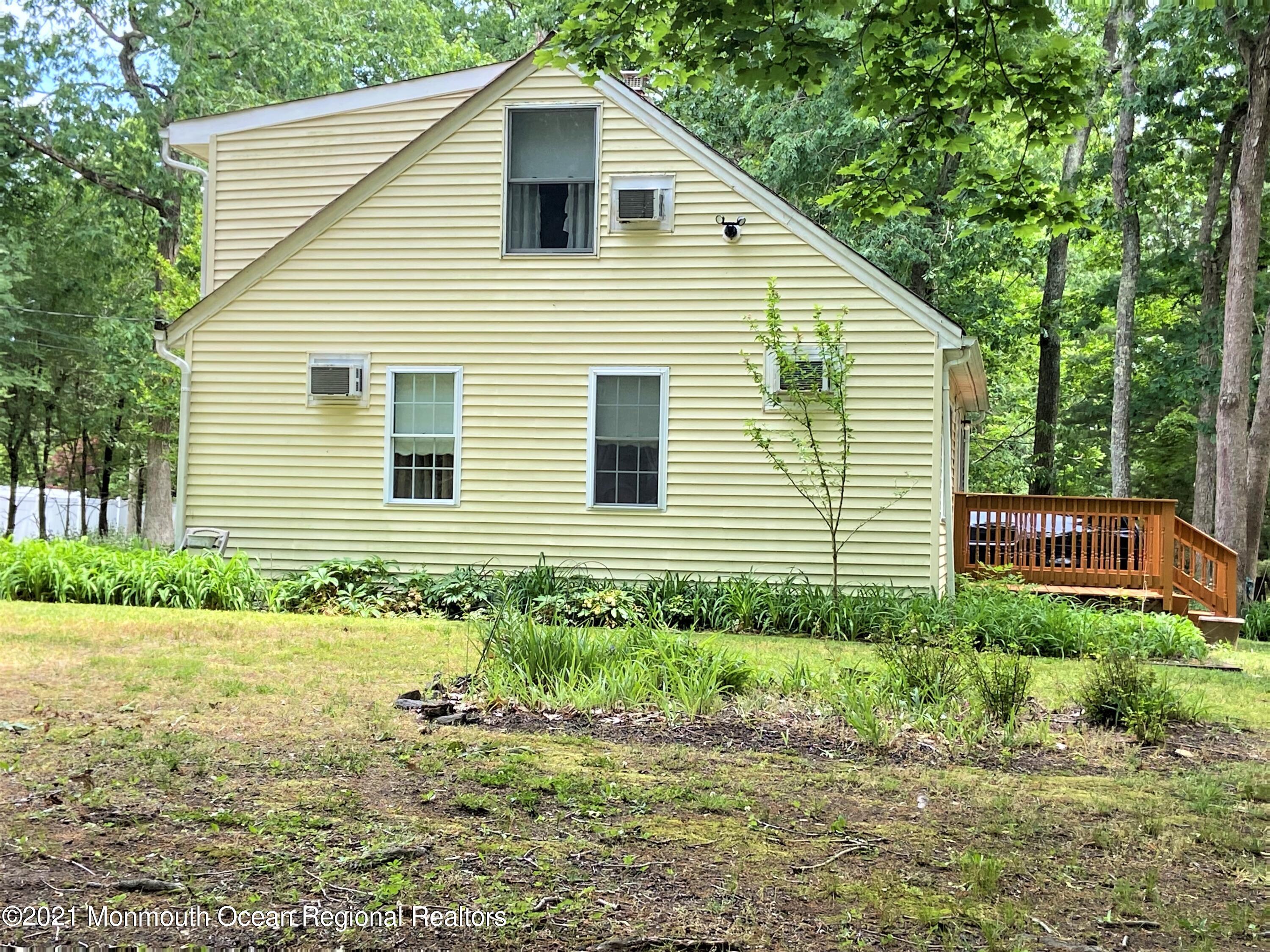 361 Black Oak Road Jackson, NJ 08527 - Photo 32 of 57 a view of a house with a yard