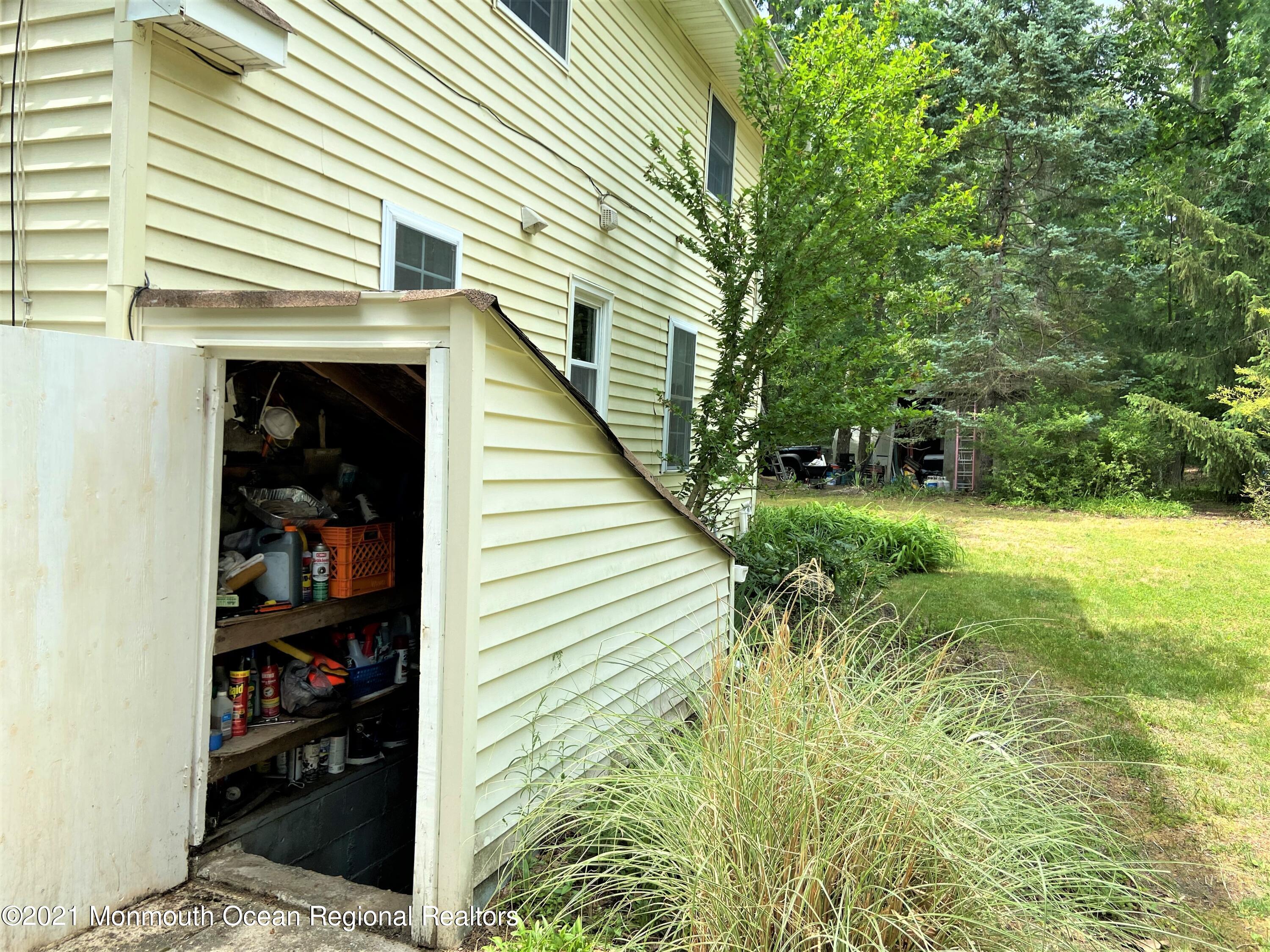 361 Black Oak Road Jackson, NJ 08527 - Photo 34 of 57 a view of a house with a yard and sitting area