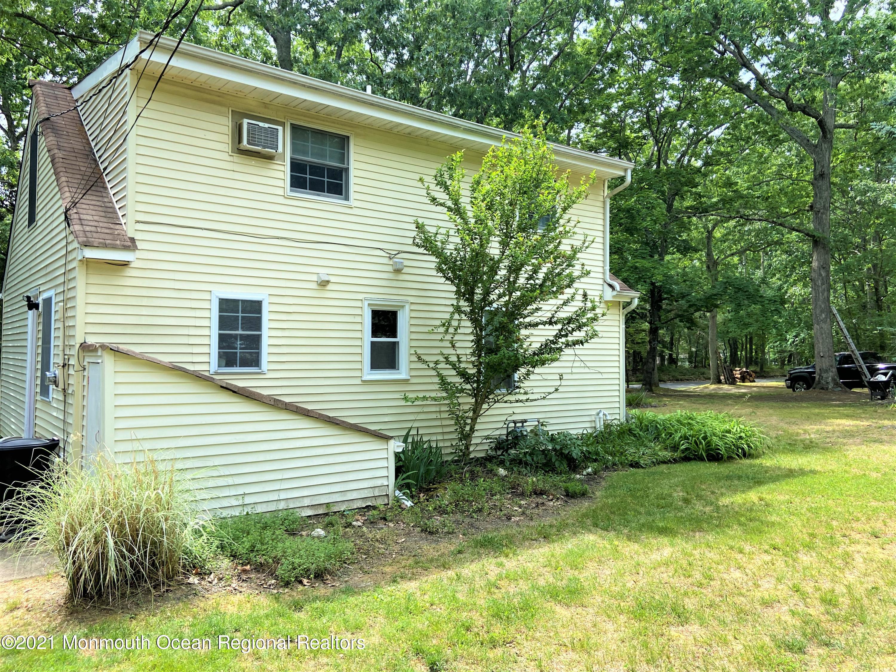 361 Black Oak Road Jackson, NJ 08527 - Photo 36 of 57 a view of a house with a yard