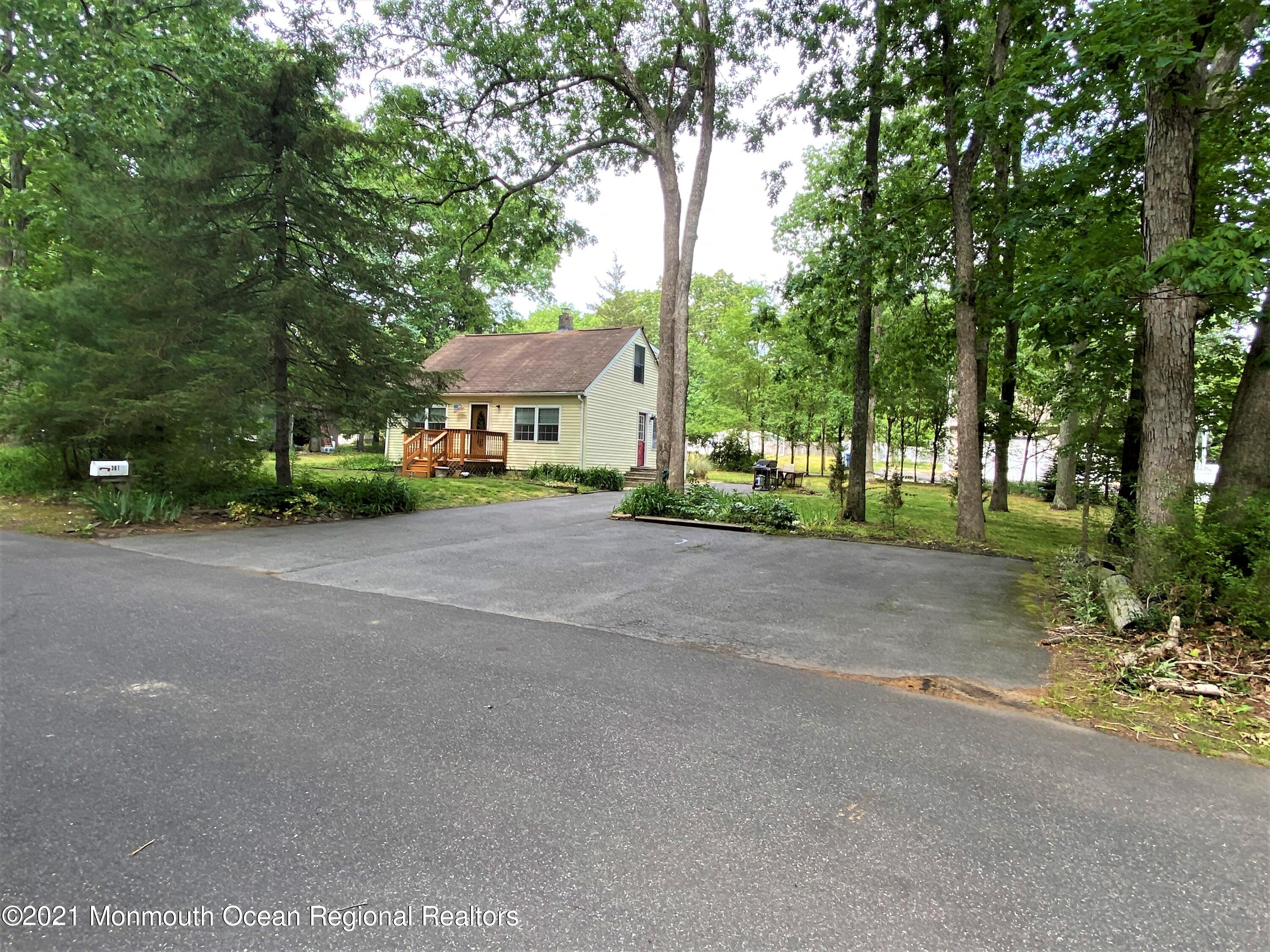 361 Black Oak Road Jackson, NJ 08527 - Photo 5 of 57 a view of a house with a tree in front of it