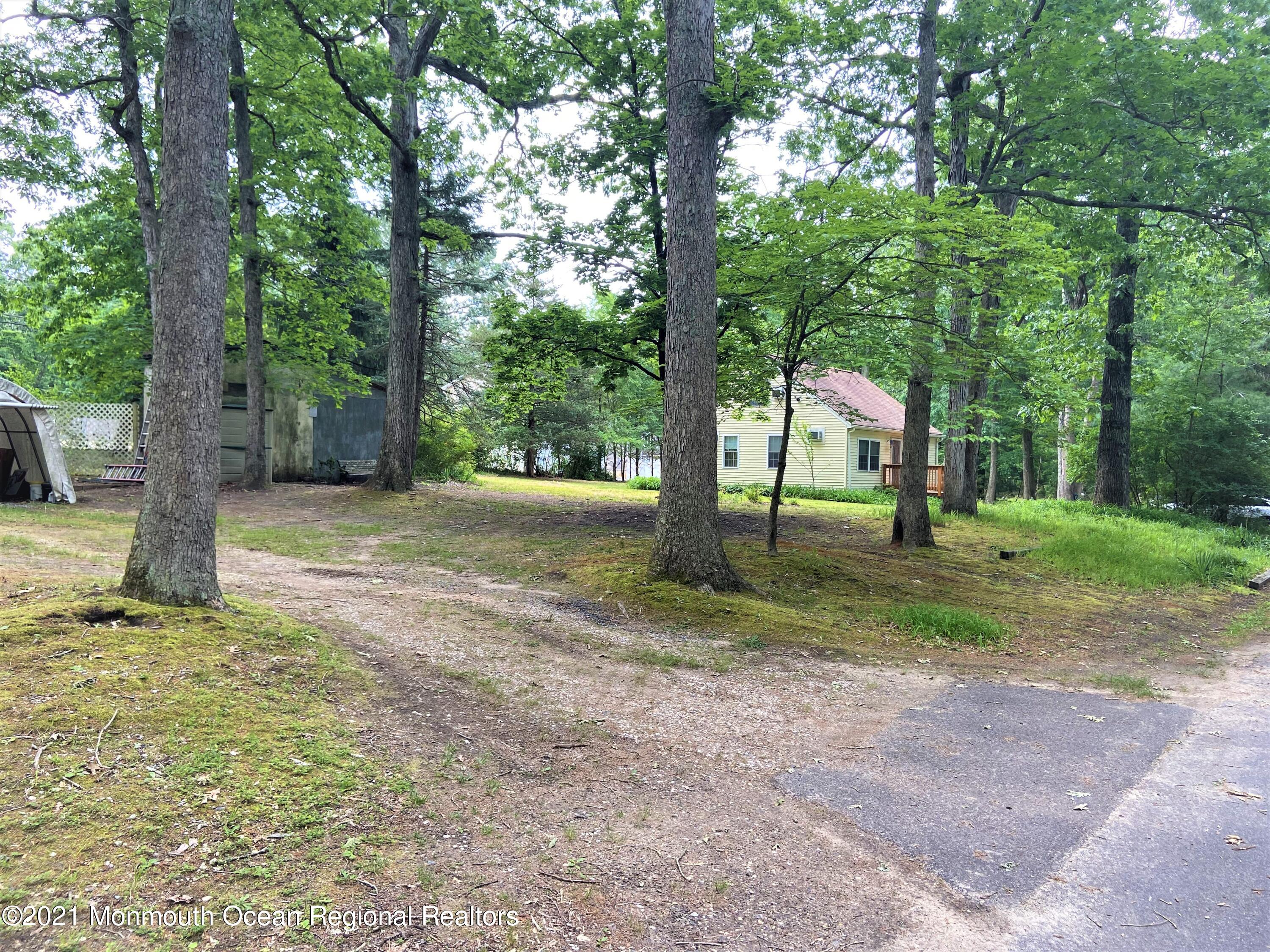 361 Black Oak Road Jackson, NJ 08527 - Photo 45 of 57 a view of a yard with tree s