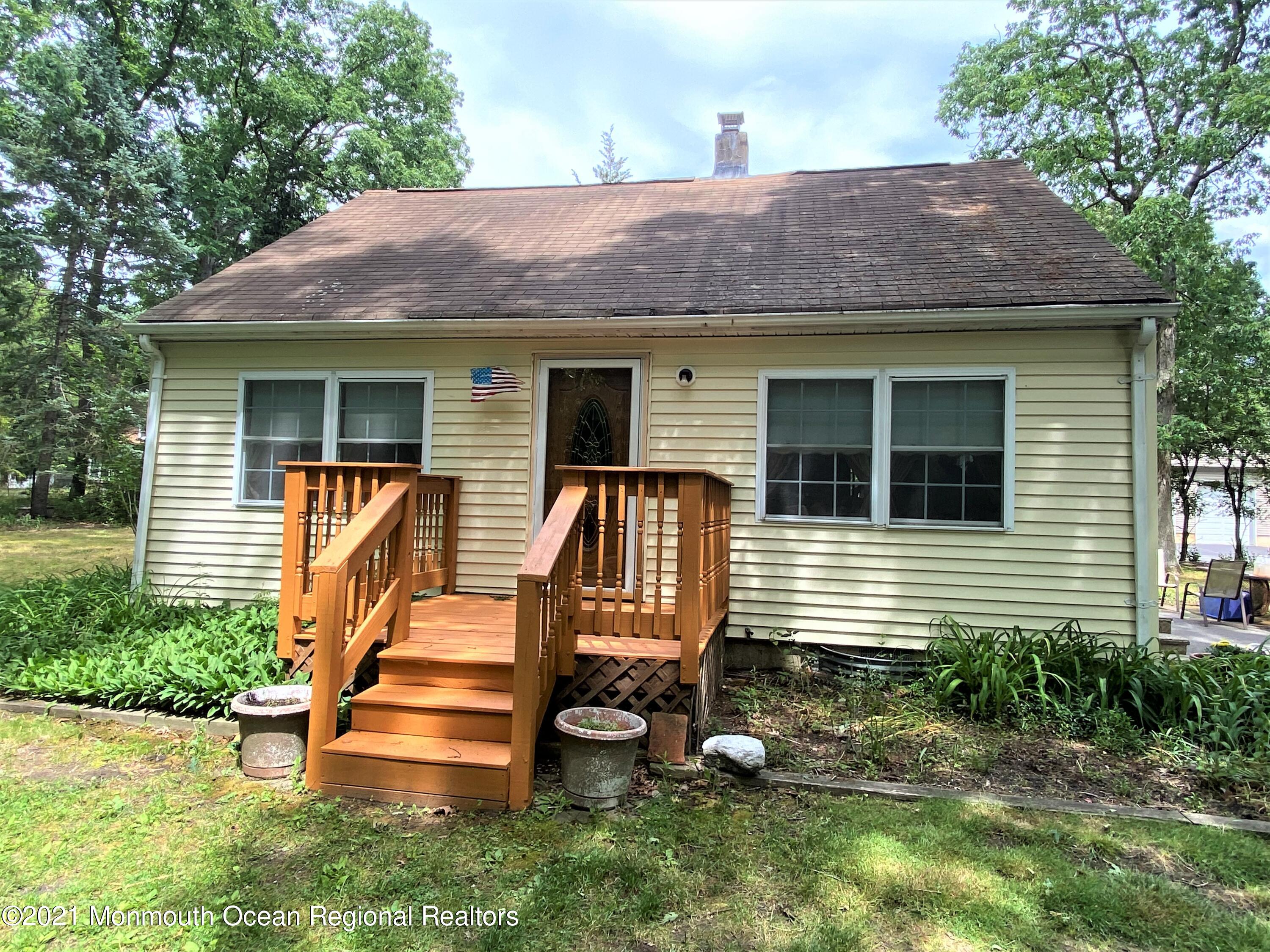 361 Black Oak Road Jackson, NJ 08527 - Photo 56 of 57 a view of a house with a yard and furniture